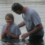 girl being baptized