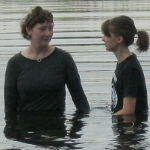 teen girl being baptized