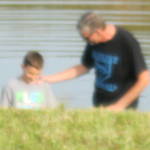 boy being baptized