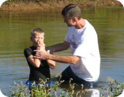 Boy being baptized Boy being baptized